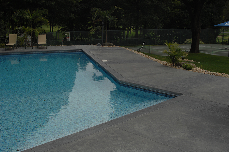 Swimming pool and stamped concrete project example 92